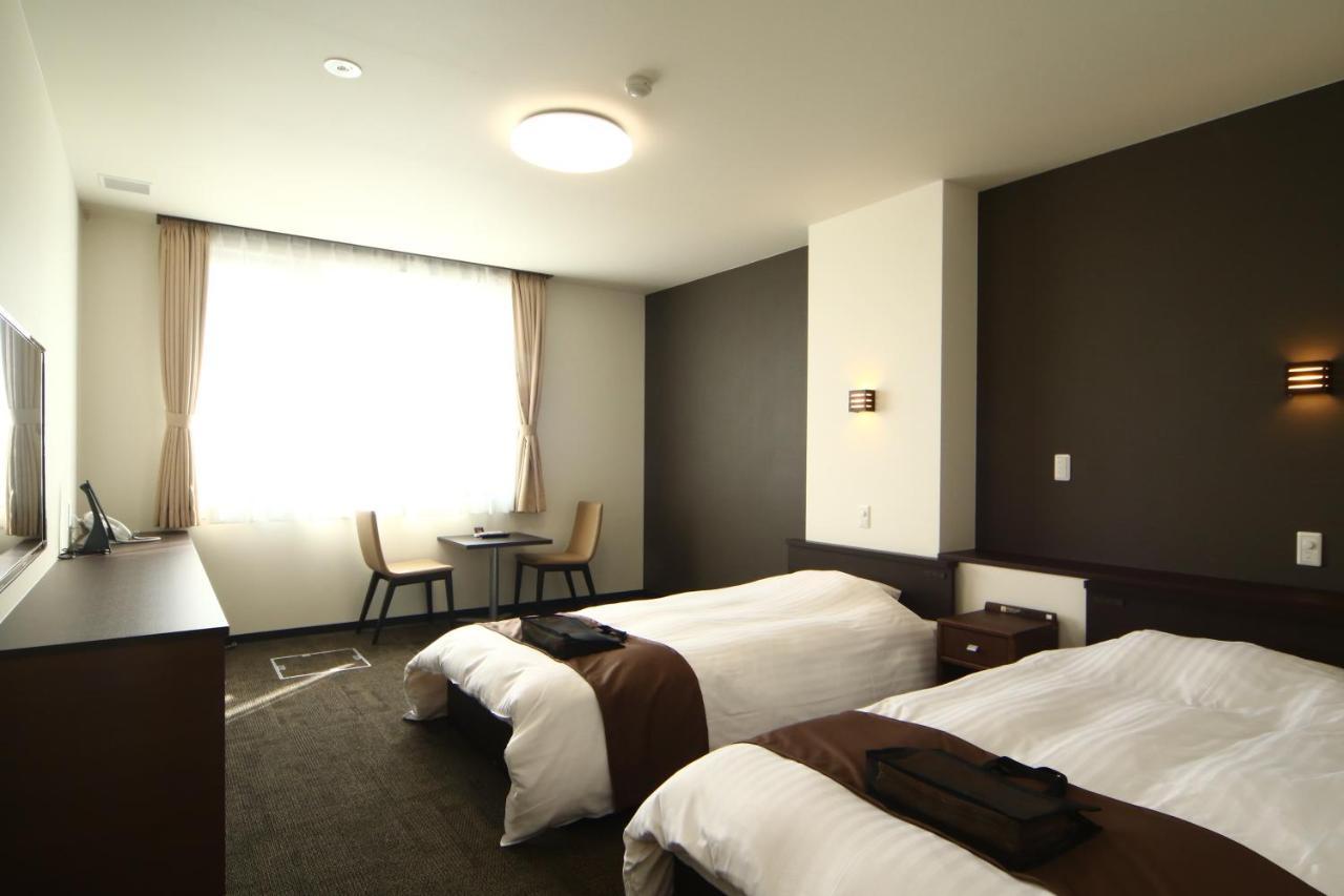 Teshio Onsen Yubae Hotel Quarto foto