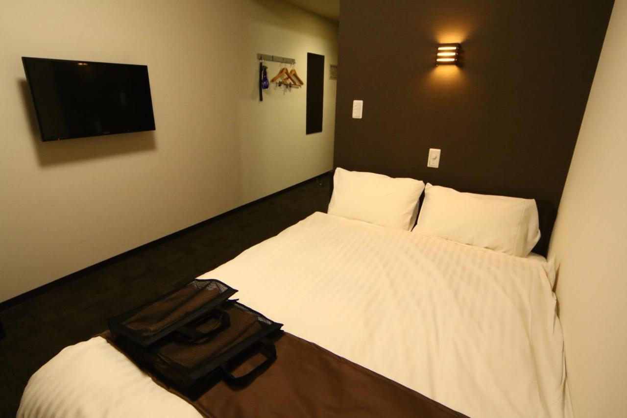 Teshio Onsen Yubae Hotel Quarto foto