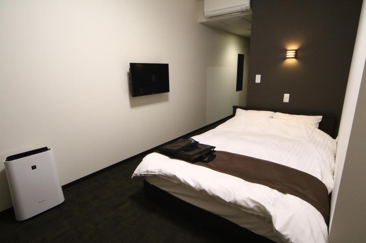 Teshio Onsen Yubae Hotel Quarto foto